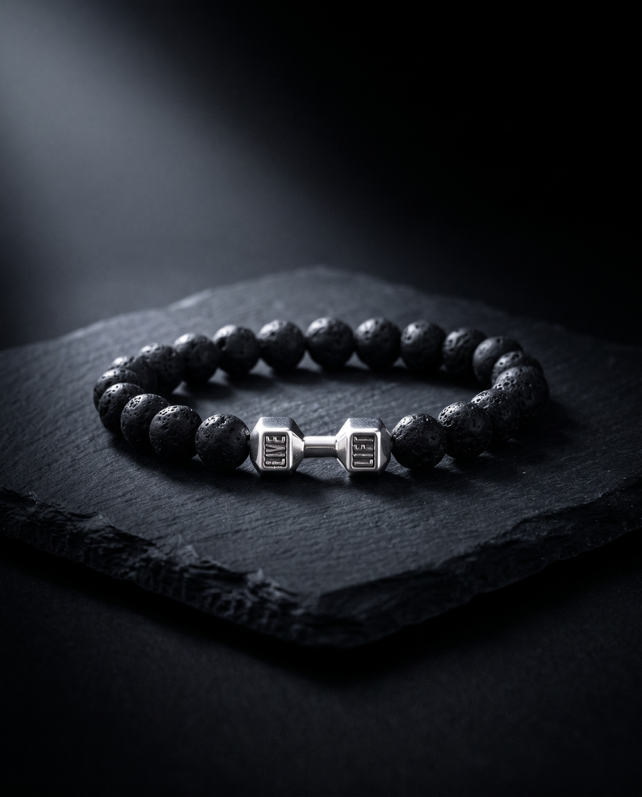 Bracelet Onyx pierres de lave et haltère argent sur pierre noire