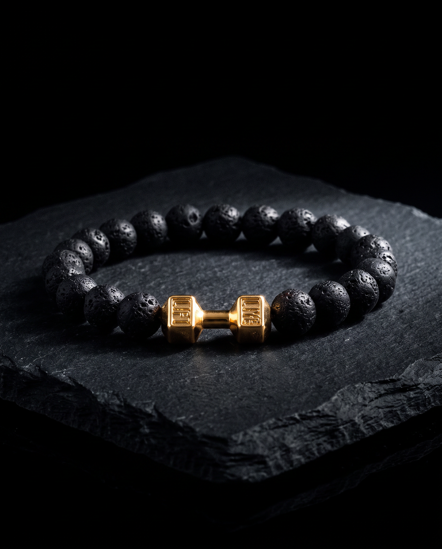 Bracelet Onyx pierres de lave et haltère or sur pierre noire